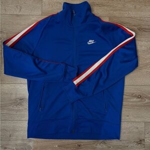 Nike Men's Blue Jacket with Red and White Stripes